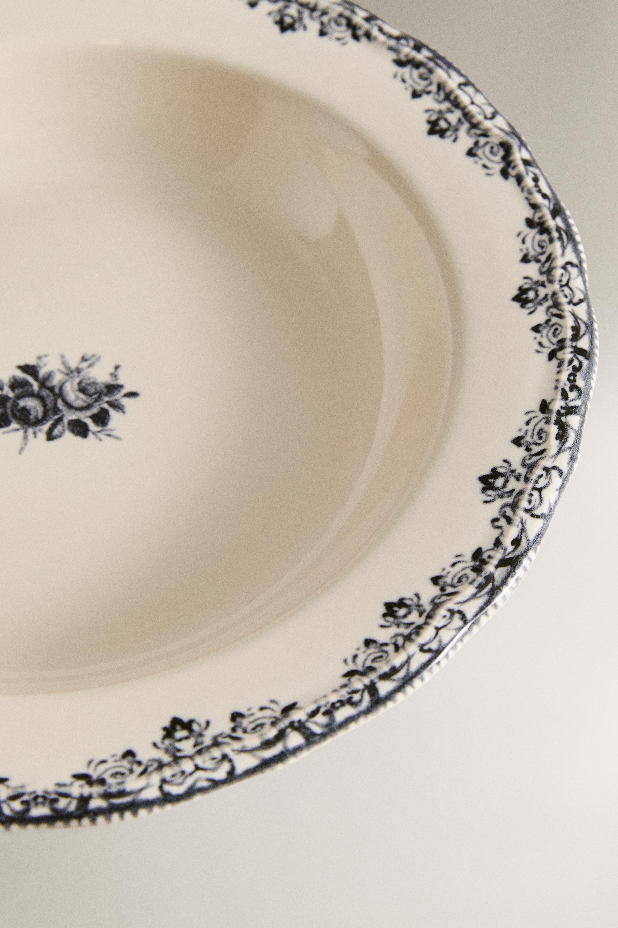 EARTHENWARE SOUP PLATE WITH PLACED DESIGN